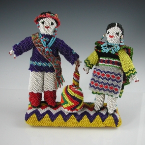 Beaded man and woman by Annie Hooee